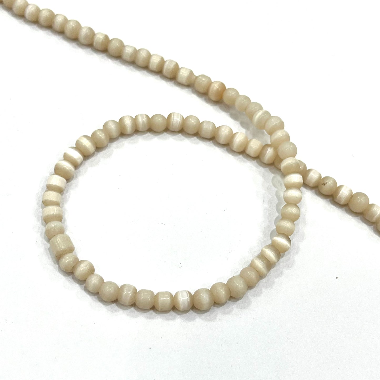 Sarta Ojo de Gato Beige 4mm